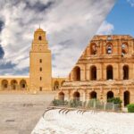 Excursion Kairouan el Jem : À la découverte de trésors historiques en Tunisie Bienvenue dans cet article passionnant sur l'excursion Kairouan el Jem, une aventure à travers les trésors historiques de la Tunisie ! Dans cette excursion, nous partirons à la découverte de deux villes emblématiques, Kairouan et el Jem, qui regorgent de richesses culturelles et architecturales. Préparez-vous à plonger dans l'histoire fascinante de cette région et à explorer des sites classés au patrimoine mondial de l'UNESCO. Suivez le guide pour une aventure inoubliable ! 1. Kairouan : La Cité des Mille Mosquées Notre première étape nous conduit à Kairouan, une ville sacrée pour les musulmans et un joyau architectural d'une grande beauté. Surnommée "La Cité des Mille Mosquées", Kairouan est l'une des plus anciennes cités islamiques du Maghreb. Son histoire remonte au VIIe siècle et elle est riche en monuments historiques. - La Grande Mosquée de Kairouan : Nous débutons notre exploration par la Grande Mosquée de Kairouan, un chef-d'œuvre de l'architecture islamique. Son minaret octogonal, haut de presque 31 mètres, est une icône de la ville. L'intérieur de la mosquée est un véritable enchantement, avec ses colonnes en marbre, ses arcs en fer à cheval et ses splendides tapisseries. - Le Bassin des Aghlabides : À proximité de la Grande Mosquée, nous découvrons le Bassin des Aghlabides, un réservoir d'eau datant du IXe siècle. Cet ouvrage hydraulique témoigne du génie des ingénieurs de l'époque et souligne l'importance de l'eau dans cette région aride. - Les Ruelles de la Médina : Perdez-vous dans les ruelles étroites de la médina de Kairouan, où l'atmosphère ancestrale vous transporte dans un autre temps. Vous y trouverez des souks colorés, des artisans talentueux et une ambiance authentique qui vous imprégnera de l'essence même de la culture tunisienne. 2. El Jem : Le Colisée de l'Afrique du Nord Après cette immersion dans la splendeur de Kairouan, cap sur el Jem, une petite ville qui abrite un trésor unique : l'amphithéâtre romain d'el Jem, également connu sous le nom de Colisée de l'Afrique du Nord. - L'Amphithéâtre d'el Jem : Ce chef-d'œuvre d'architecture romaine est un incontournable absolu de la Tunisie. Avec une capacité d'accueil de 35 000 spectateurs, il était autrefois le théâtre de combats de gladiateurs et de spectacles grandioses. Aujourd'hui, il est encore utilisé pour des festivals et des événements culturels qui vous feront revivre l'époque glorieuse de l'Antiquité. - Le Musée d'el Jem : À proximité de l'amphithéâtre, ne manquez pas de visiter le Musée d'el Jem qui abrite une impressionnante collection d'objets archéologiques, dont des sculptures, des mosaïques et des vestiges romains, vous plongeant davantage dans l'histoire passionnante de cette région. 3. Une expérience culinaire unique Une excursion ne serait pas complète sans goûter aux délices culinaires locaux ! Profitez des arrêts dans les restaurants traditionnels pour déguster des plats typiques tels que le couscous, le tajine, les bricks et les pâtisseries orientales. Laissez-vous séduire par les saveurs authentiques de la Tunisie. Conclusion L'excursion Kairouan el Jem est une véritable aventure dans le temps, vous plongeant dans les racines historiques de la Tunisie. La richesse culturelle, les monuments majestueux et les expériences culinaires mémorables font de cette excursion un voyage inoubliable. Alors, préparez vos bagages et partez à la découverte de ces trésors historiques, le voyage d'une vie vous attend !