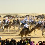 Festival Douz Sud Tunisie : Plongez dans une Expérience Culturelle Envoûtante Si vous êtes en quête d'une expérience culturelle immersive et inoubliable, ne cherchez pas plus loin que le Festival Douz Sud Tunisie. Ce festival captivant, ancré dans les traditions riches du sud de la Tunisie, est une célébration vibrante de la musique, de la danse et de l'artisanat qui vous transporte dans un monde de découvertes. Dans cet article, nous allons explorer les charmes uniques du Festival Douz Sud Tunisie et pourquoi vous devriez envisager de faire partie de cette célébration époustouflante. Le Festival Douz : Un Aperçu Enchanté Le Festival International du Sahara à Douz est un événement annuel qui attire des visiteurs du monde entier pour célébrer la culture fascinante du sud de la Tunisie. Nichée aux portes du désert du Sahara, la ville de Douz devient le théâtre d'une aventure culturelle extraordinaire. Le festival met en lumière les traditions bédouines séculaires, les rythmes envoûtants de la musique saharienne et l'artisanat raffiné qui font de cette région une destination unique. Une Célébration de la Musique et de la Danse L'une des facettes les plus enchanteresses du Festival Douz est sa mise en avant de la musique et de la danse traditionnelles. Des troupes locales et internationales se produisent sur scène, apportant une symphonie de sons captivants allant des chants bédouins aux mélodies contemporaines inspirées par le désert. Les spectateurs sont invités à danser au rythme de la musique, créant ainsi une atmosphère de joie partagée et d'unité. L'Artisanat qui Raconte des Histoires Le souk du festival est un véritable trésor pour les amateurs d'artisanat. Des étals colorés présentent une variété d'objets fabriqués à la main, allant des tapis berbères aux bijoux en argent exquis en passant par les poteries artistiques. Chaque pièce raconte une histoire unique de tradition et de savoir-faire. En achetant des articles au souk, vous soutenez également les artisans locaux et contribuez à la préservation de l'artisanat authentique. Une Saveur Culinaire Époustouflante La gastronomie joue un rôle central au Festival Douz Sud Tunisie. Les visiteurs ont l'opportunité de savourer une variété de plats délicieux, des couscous parfumés aux tajines riches en saveurs, en passant par les dattes sucrées qui sont une spécialité de la région. L'expérience de la cuisine saharienne est une immersion totale dans la culture locale et une célébration des délices culinaires du sud de la Tunisie. Plongez dans la Magie du Festival Douz Sud Tunisie En conclusion, le Festival Douz Sud Tunisie est bien plus qu'un simple événement. C'est une occasion de plonger dans la richesse de la culture saharienne, de créer des souvenirs durables et de se connecter avec des gens du monde entier. Que vous soyez un passionné de musique, un amateur d'art ou un aventurier en quête de nouvelles expériences, ce festival a quelque chose à offrir à tous. N'hésitez pas à ajouter le Festival Douz Sud Tunisie à votre liste de destinations à découvrir. Immergez-vous dans l'atmosphère enivrante de la musique, de la danse, de l'artisanat et de la cuisine qui font de cet événement une expérience culturelle extraordinaire. Préparez-vous à être transporté dans un monde de traditions et de festivités au cœur du désert, une expérience qui restera gravée dans votre mémoire pour toujours.