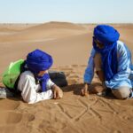 Vous rêvez de découvrir les mystères du Sahara tunisien ? Vous êtes au bon endroit ! Avec SudTunisie.com, plongez dans l'aventure ultime à travers le Sahara. Laissez-nous vous guider à travers les dunes dorées, les oasis luxuriantes et les villes antiques pour une expérience inoubliable. L'Authenticité du Sahara Tunisien Le Sahara tunisien est bien plus qu'un simple désert. C'est un monde à part entière, avec sa culture riche et ses paysages époustouflants. SudTunisie.com vous offre la chance de vivre cette authenticité de près. Explorez les marchés animés où les artisans locaux vendent leurs trésors, goûtez aux délices de la cuisine tunisienne et plongez dans l'hospitalité chaleureuse des habitants. Nos Circuits Sud : Un Voyage Sur-Mesure Chez SudTunisie.com, nous comprenons que chaque voyageur est unique. C'est pourquoi nos circuits sud sont conçus sur mesure pour répondre à vos besoins et désirs. Que vous soyez passionné d'aventure, amateur d'histoire ou simplement en quête de détente, nous avons le circuit parfait pour vous. Explorez les anciennes cités de Carthage et de Dougga, campez sous les étoiles dans le désert ou détendez-vous sur les plages de sable fin. Avec nous, chaque journée est une nouvelle aventure à vivre. Nos Guides Locaux Experts Pour rendre votre expérience encore plus enrichissante, nos circuits sud sont accompagnés par des guides locaux experts. Ils connaissent le Sahara comme leur poche et sont passionnés par leur culture. Grâce à eux, vous découvrirez des endroits secrets, entendrez des histoires fascinantes et participerez à des activités uniques. Que vous soyez intéressé par l'observation des étoiles, les randonnées à dos de chameau ou les rencontres avec les nomades du désert, nos guides vous guideront avec enthousiasme. Réservez Votre Aventure Dès Aujourd'hui ! Préparez-vous à vivre l'aventure de votre vie au cœur du Sahara tunisien avec SudTunisie.com. Ne manquez pas l'opportunité de découvrir l'authenticité de ce désert mythique. Réservez dès aujourd'hui et laissez-vous séduire par la magie du Sahara. Votre voyage de rêve commence ici.