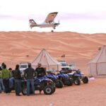 Le Sahara tunisien offre une expérience de camping unique au monde. Rien ne peut égaler la majesté des dunes de sable doré, le silence enveloppant de vastes étendues désertiques et la pureté du ciel étoilé. Le camping dans le Sahara tunisien promet une aventure inoubliable pour ceux qui recherchent une communion avec la nature et la découverte de paysages à couper le souffle. Plongez dans l'Immensité du Sahara Tunisien Expérience de Camping Authentique Le camping dans le Sahara tunisien offre une immersion totale dans l'environnement désertique. Éloignez-vous du tumulte de la vie quotidienne et plongez dans un silence paisible, loin de toute agitation urbaine. Installez-vous dans des camps traditionnels ou sous les étoiles scintillantes pour ressentir la véritable essence de la nature. Randonnées et Exploration Le Sahara tunisien est un paradis pour les aventuriers. Partez à la découverte des dunes ondulantes lors de randonnées excitantes. Émerveillez-vous devant la beauté brute des paysages changeants et laissez-vous envoûter par la magie du désert. Chaque pas est une aventure, une occasion de se connecter avec la terre et de vivre l'instant présent. Une Connexion Profonde avec la Nature Nuits Étoilées et Couchers de Soleil Époustouflants Les nuits dans le Sahara tunisien offrent un spectacle céleste incomparable. Le ciel dégagé permet d'admirer une myriade d'étoiles étincelantes, créant une toile scintillante au-dessus de vous. Les couchers de soleil peignent le désert dans des teintes chaudes et chatoyantes, créant des panoramas dignes d'une peinture. Rencontres Culturelles et Hospitalité Locale Rencontrez les nomades locaux et découvrez leurs traditions ancestrales. L'hospitalité des habitants du désert est légendaire. Partagez un thé à la menthe, écoutez des histoires fascinantes et apprenez des coutumes qui ont été transmises de génération en génération. Le camping dans le Sahara tunisien est bien plus qu'une simple aventure. C'est une rencontre avec l'immensité, la beauté brute et la sérénité du désert. Une expérience qui transcende le temps et l'espace, offrant des souvenirs impérissables et une connexion profonde avec la nature. Rejoignez-nous pour une aventure hors du commun, et laissez le Sahara tunisien vous emporter dans un voyage inoubliable.