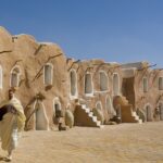 Découvrir le Sud Tunisien en VIP Bienvenue dans l'univers fascinant du voyage VIP dans le Sud Tunisien. Imaginez-vous au volant, traversant des paysages époustouflants où le désert rencontre l'oasis, où l'histoire ancienne se mêle à la modernité. Ce circuit vous promet une expérience unique, loin des sentiers battus, où chaque kilomètre parcouru révèle une nouvelle facette de la beauté de la Tunisie. Circuit Privé au Sud Tunisien : Authenticité et Confort Ce circuit privé est conçu pour les voyageurs exigeants en quête d'authenticité et de confort. Vous serez accompagné par des guides locaux experts qui vous dévoileront les secrets bien gardés de cette région emblématique. Explorez des sites historiques, goûtez aux saveurs locales et imprégnez-vous de la culture tunisienne dans toute sa splendeur. VIP : Un Voyage Sur Mesure Le voyage VIP au Sud Tunisien vous offre bien plus qu'une simple escapade : c'est une immersion totale dans un monde de luxe et de prestige. Profitez de services personnalisés, d'hébergements raffinés et d'activités exclusives adaptées à vos préférences. Chaque détail est pensé pour vous offrir une expérience inoubliable, où votre seul souci sera de savourer chaque instant. Sud Tunisien Top VIP : Une Aventure Inégalée Pour ceux qui recherchent l'exclusivité absolue, le circuit Sud Tunisien Top VIP est l'option parfaite. Explorez les trésors cachés de Tozeur, plongez dans l'ambiance envoûtante de Douz et découvrez les paysages lunaires de Matmata. Ce voyage est une invitation à vivre l'exceptionnel, à créer des souvenirs uniques et à explorer un patrimoine riche d'histoire et de beauté naturelle.